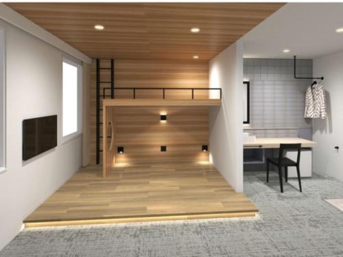Телевизор и/или развлекательный центр в K,M,H Art hotel by Kure Morisawa - Vacation STAY 23294v