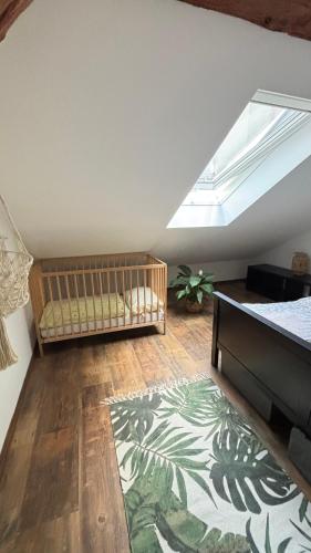 Ένα ή περισσότερα κρεβάτια σε δωμάτιο στο Tanny Boho Housy na pešej zóne s 2 parkovacími miestami
