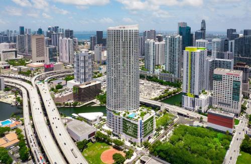 an aerial view of a large city with traffic at Flow Brickell Hotel in Miami