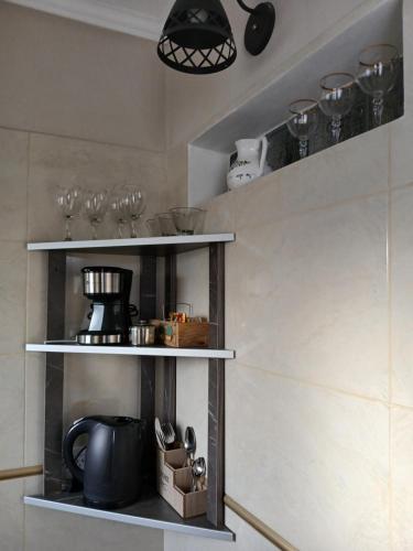 Η κουζίνα ή μικρή κουζίνα στο ARWEN Suites 1