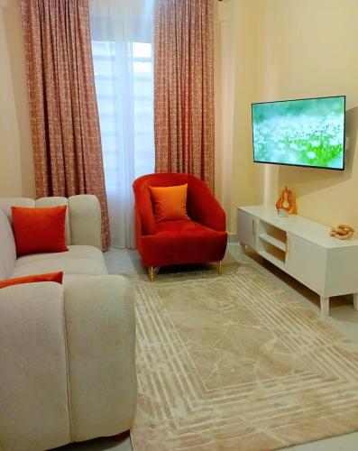 TV a/nebo společenská místnost v ubytování Melba homes