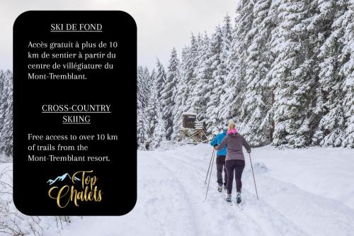 a woman is cross country skiing in the snow at Huge condo in front of Tremblant ski resort in Mont-Tremblant