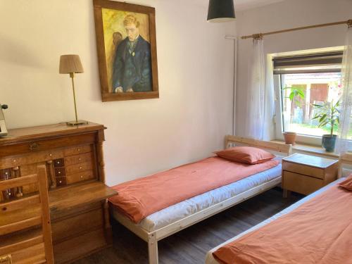 Katil atau katil-katil dalam bilik di Las Vioska Art Accommodation