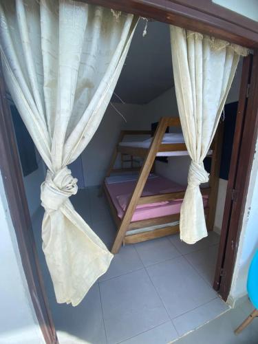 Postel nebo postele na pokoji v ubytování Apartaestudio Sara en Coveñas