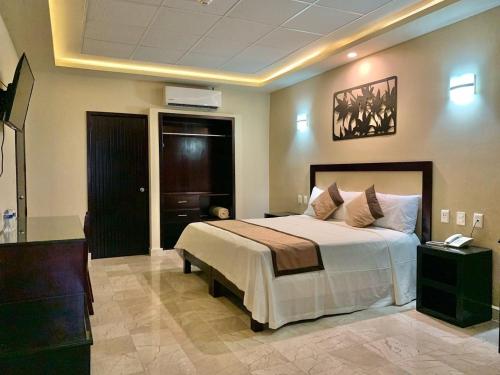 Postel nebo postele na pokoji v ubytování Hotel Yorio Inn