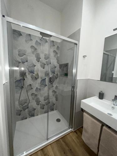 a bathroom with a shower and a sink at Pertichetti Living in Foligno