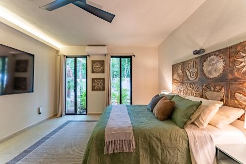 Postel nebo postele na pokoji v ubytování La Cueva de Piedra