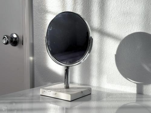 a mirror on a stand on a table at Harrison Ranchhr4 in Visalia