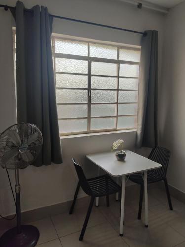 Posezení v ubytování Apartamento Kitnet No Centro São Lourenço