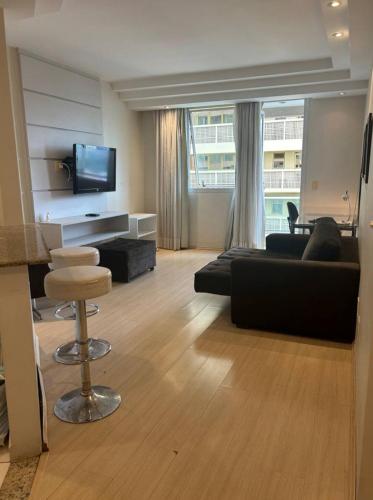Una televisión o centro de entretenimiento en Flat Sequoia Residence