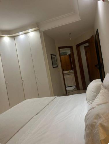 Una cama o camas en una habitación de Flat Sequoia Residence