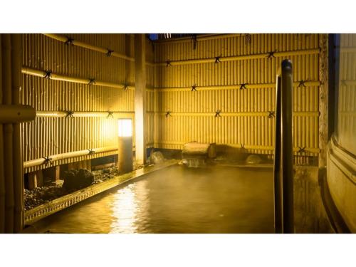 a room with a pool of water in a building at Hotel Symphony - Vacation STAY 85393v in Sagae