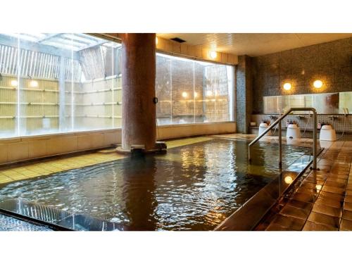 a large pool of water in a large room at Hotel Symphony - Vacation STAY 85393v in Sagae