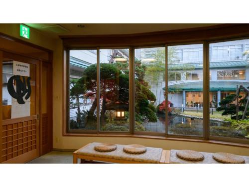 a room with a table and a large window at Hotel Symphony - Vacation STAY 85393v in Sagae