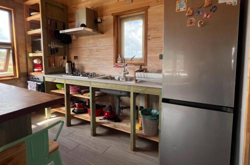 Kuchyň nebo kuchyňský kout v ubytování Cabaña Casa Calbuco
