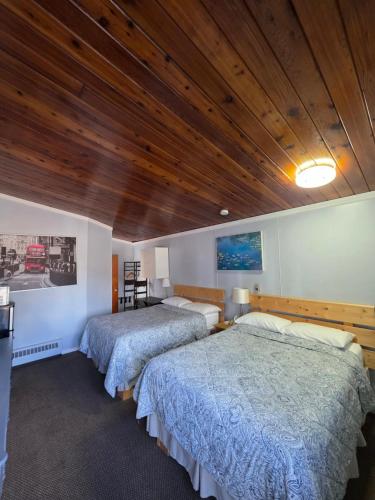 Ένα ή περισσότερα κρεβάτια σε δωμάτιο στο Bio Vista Motel