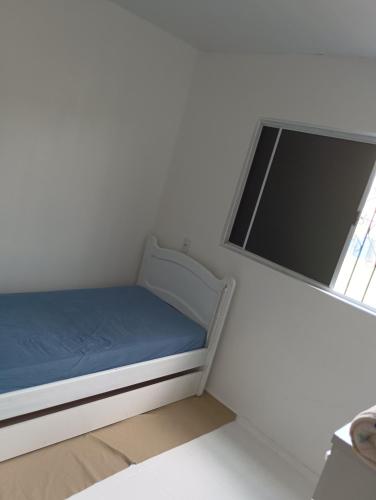 Postel nebo postele na pokoji v ubytování Hospedagem Nininha