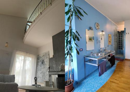 un salon avec deux lavabos et une plante dans l'établissement Villa Irim tra il mare e la montagna, 