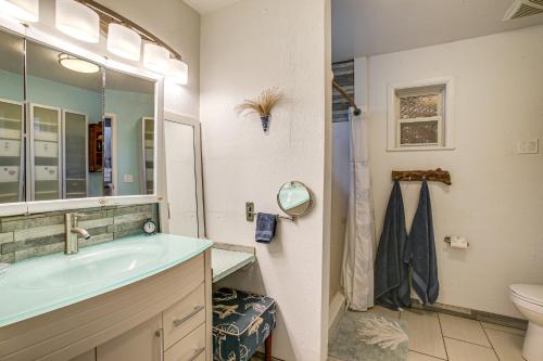 a bathroom with a sink and a toilet at Riverfront Duplex Dock and Views in Nine Mile Falls in Nine Mile Falls