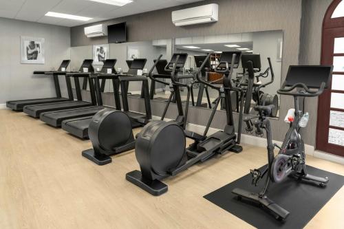 a gym with rows of exercise bikes and ellipticals at Courtyard Palo Alto Los Altos in Palo Alto