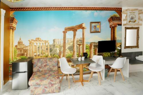 TV a/nebo společenská místnost v ubytování Schlagerschloss Hotel