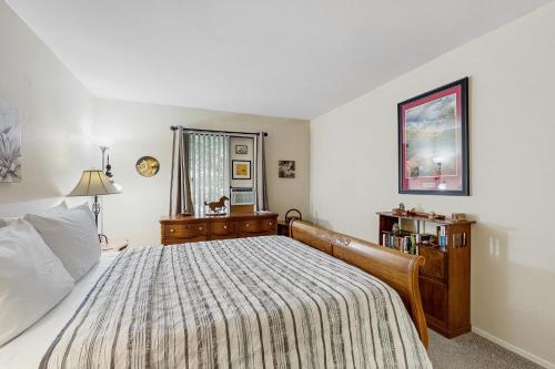 a bedroom with a large bed and a window at Sedona Sky Sanctuary in Sedona