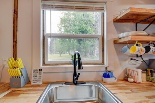 a kitchen with a sink and a window at Near Twilight Sites and Scenic Hikes Forks Apt in Forks