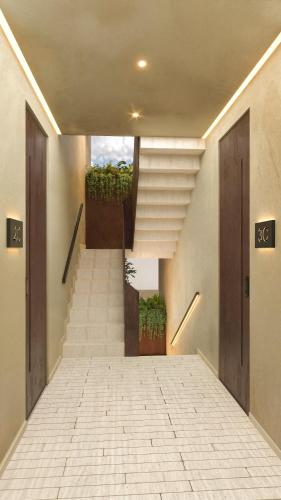 a staircase in a building with a stair case at Casa Tasman in Mexico City