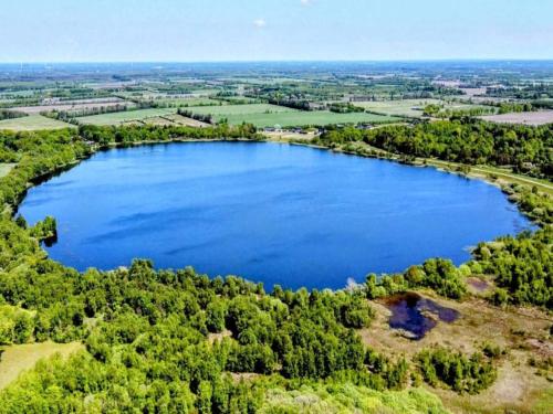 an aerial view of a lake in the countryside at 6 person holiday home in Ansager-By Traum in Ansager