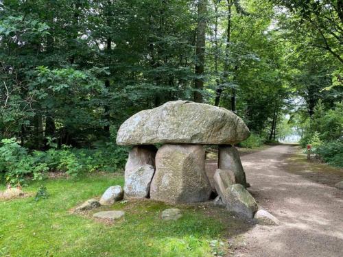 a statue of a mushroom on a path at 6 person holiday home in Hovborg-By Traum in Hovborg