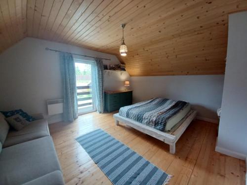 Ένα ή περισσότερα κρεβάτια σε δωμάτιο στο Hikeslovakia House