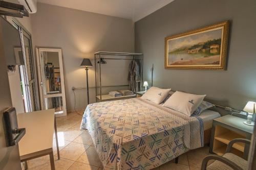 Ένα ή περισσότερα κρεβάτια σε δωμάτιο στο K3 Residence Copa & Cozinha