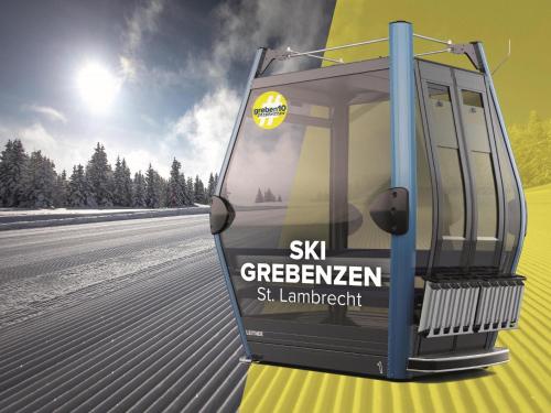 a bus on a road with the words skg greenkeeper at Grebenzen Lodge Pabstin 36B in Sankt Lambrecht