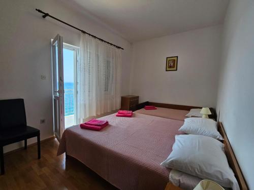 Ένα ή περισσότερα κρεβάτια σε δωμάτιο στο Apartment Savar 8079a