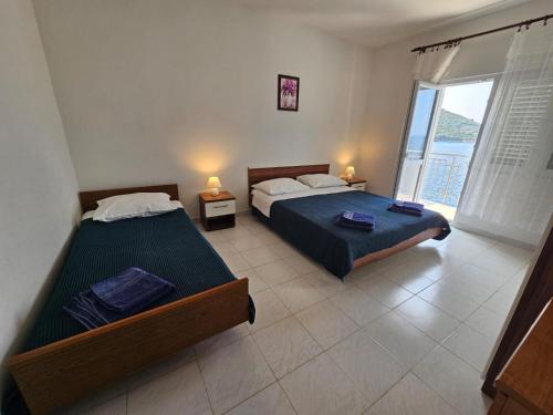 Katil atau katil-katil dalam bilik di Apartment Savar 8079c