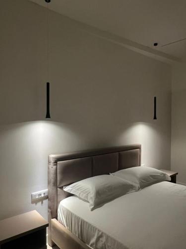 Ένα ή περισσότερα κρεβάτια σε δωμάτιο στο Hotel Gramozi