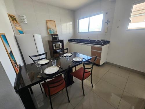 Una cocina o cocineta en Aconchego