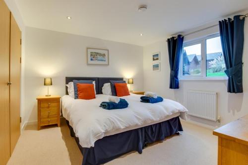 En eller flere senge i et værelse på Calypso