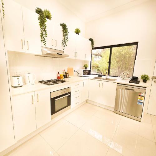 Kuchyň nebo kuchyňský kout v ubytování The Frederick Guest House