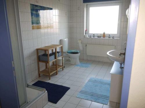 Ένα μπάνιο στο Holiday apartment with 2 bedrooms