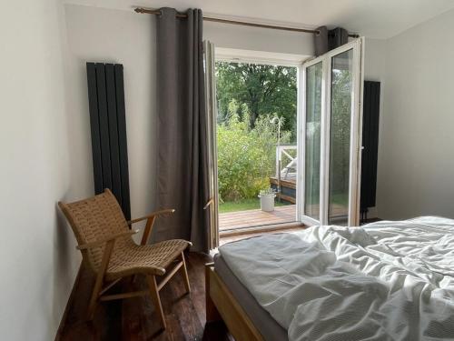 Ένα ή περισσότερα κρεβάτια σε δωμάτιο στο Holiday home in Hemmoor with swimming pool