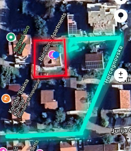 a map of a city with a red square at Barcelona Apartments in Tivat