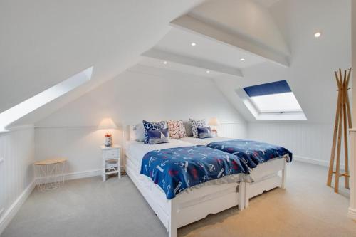 Voodi või voodid majutusasutuse Urchins Peak toas