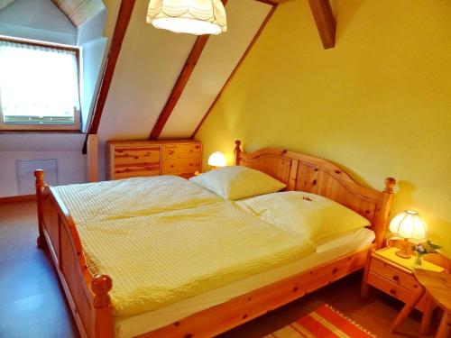 Postel nebo postele na pokoji v ubytování Landhaus Löwenzahn