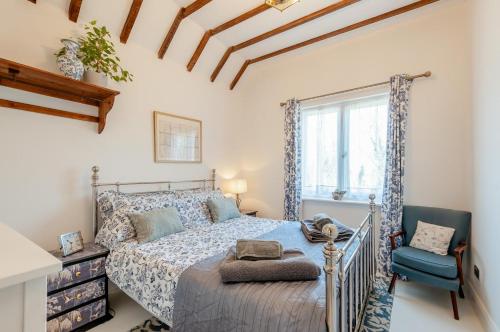 Voodi või voodid majutusasutuse Gazen View Cottage toas