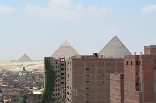 a view of the pyramids from the city at king pyramids in Cairo
