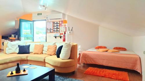 Кровать или кровати в номере Discovery Apartment