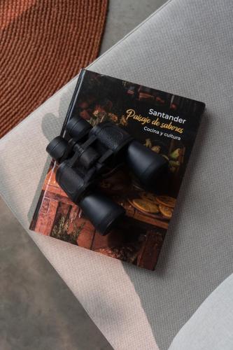 a book sitting on top of a table at Colina Bio Hotel in Los Curos