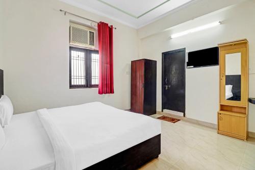 Postel nebo postele na pokoji v ubytování Hotel O White House