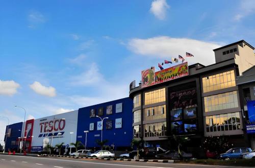 a building on the side of a street at Hotel Sayang in Kulai